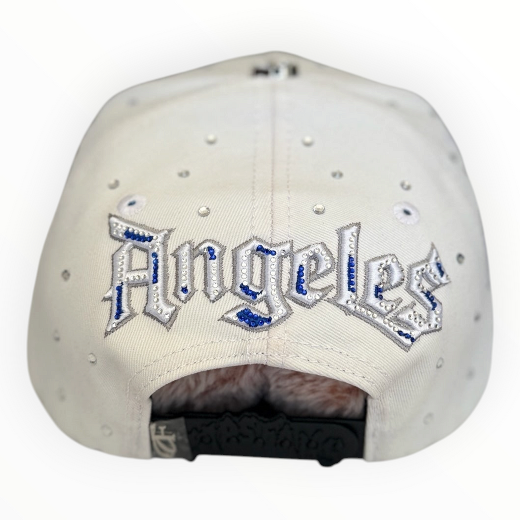 Hype Block white snapback cap featuring blue and silver Angeles embroidery and scattered rhinestones on the back