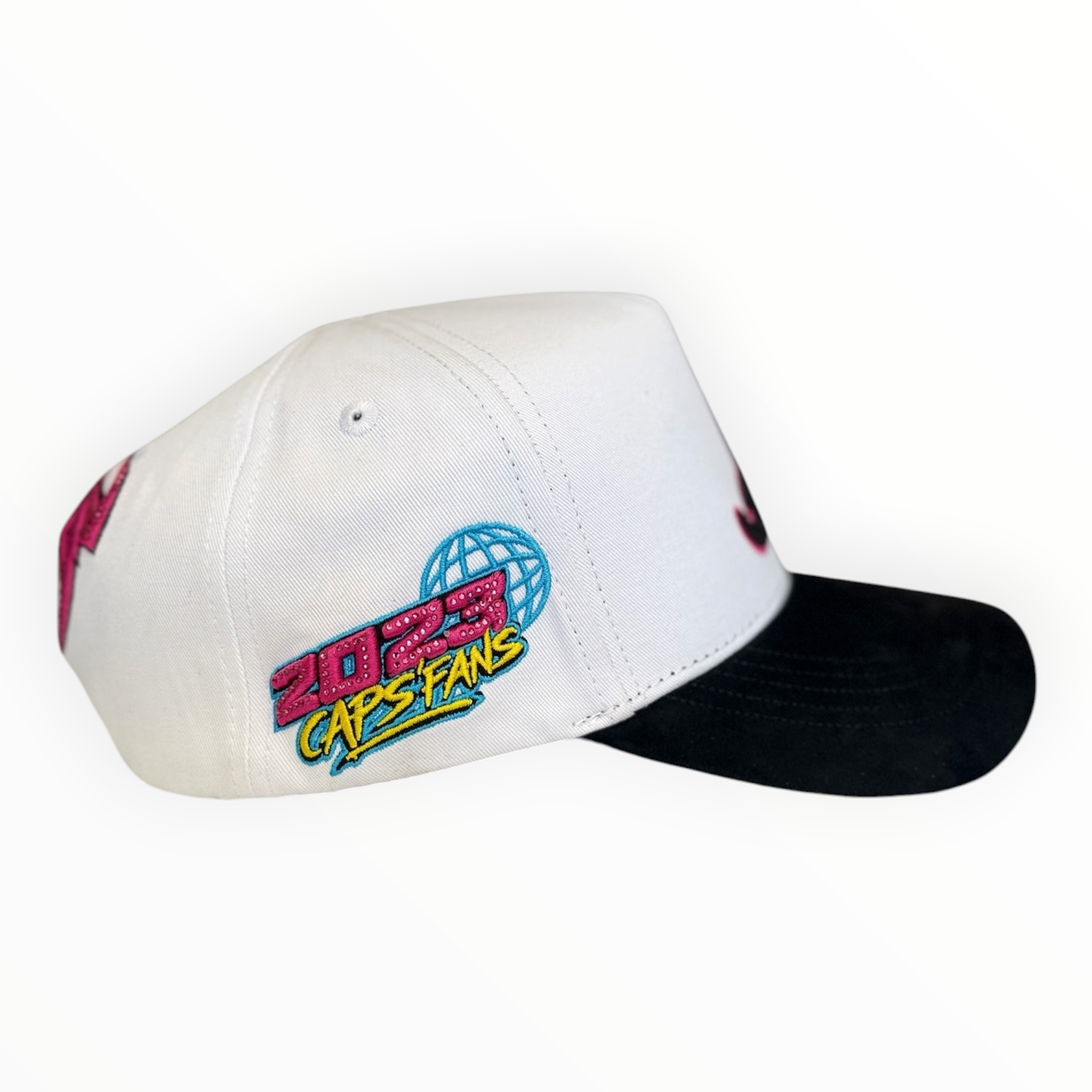 Hype Block baseball cap with white crown, black brim, and vibrant pink and blue 2023 Caps Fans side embroidery.