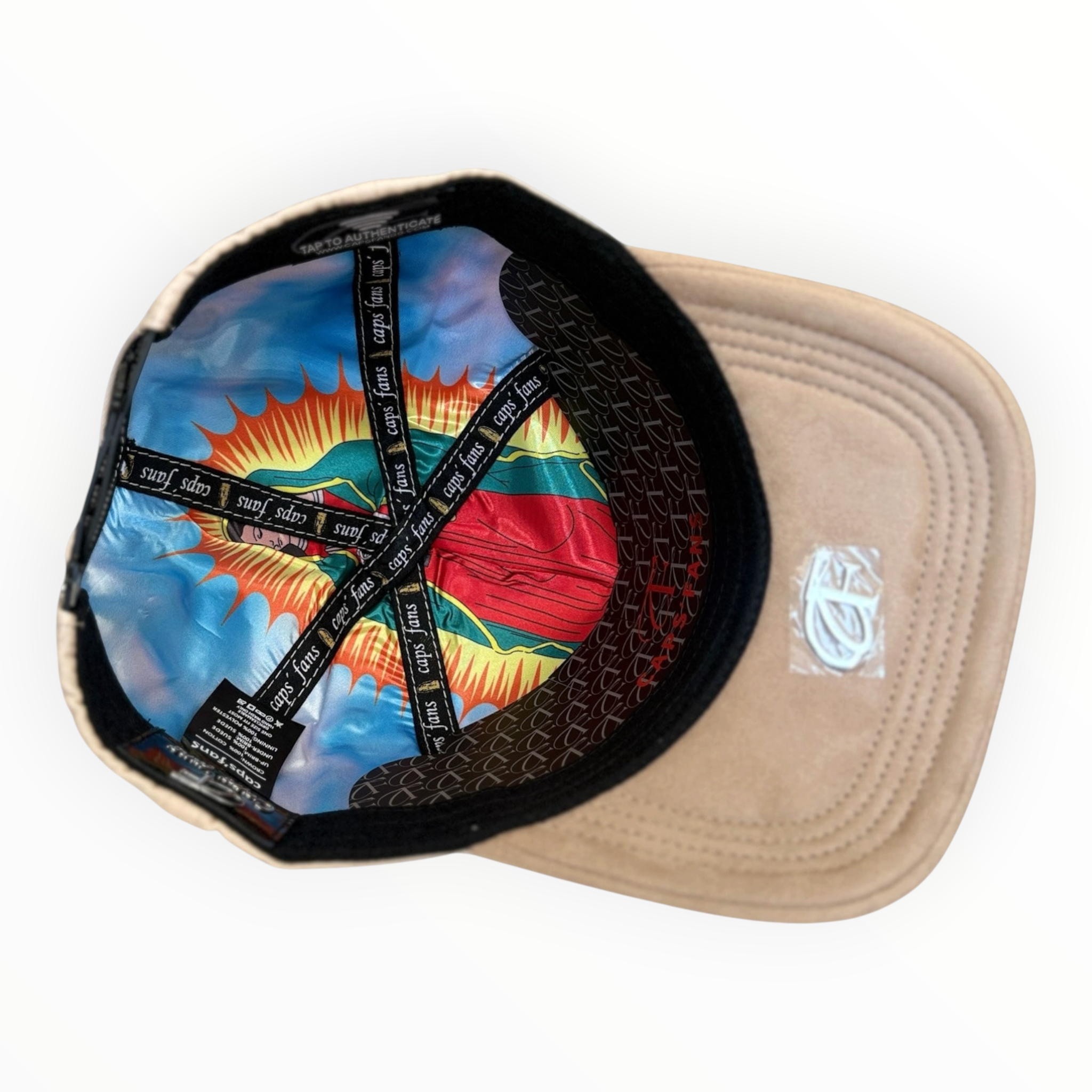 Interior view of Hype Block baseball cap featuring a vibrant Virgin of Guadalupe print lining and tan suede-feel brim.