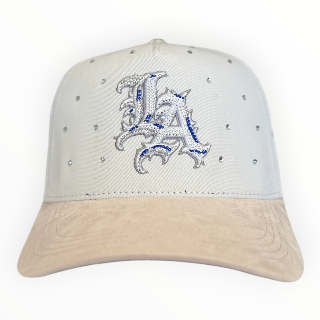 Hype Block white snapback cap with rhinestone LA logo and beige suede brim, front view