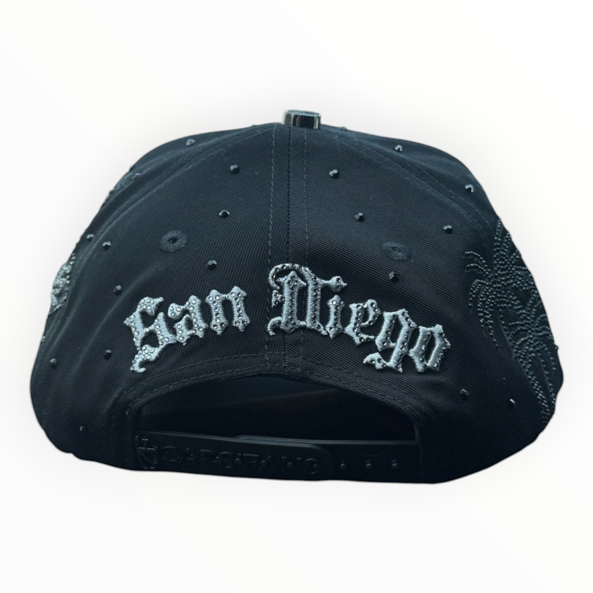 Hype Block black San Diego Padres snapback cap featuring rhinestone San Diego lettering and side palm tree detailing.
