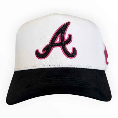 Hype Block baseball cap with a white crown, black brim, and a prominent pink and black glittery A logo on the front.
